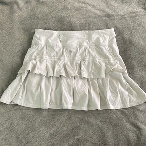 White Lululemon size 4 skort with elastic banding around legs